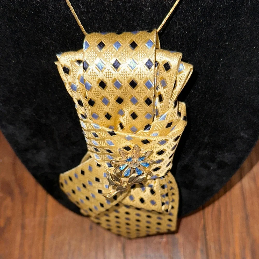 Vintage silk Gold Tie with Blue Accents and Floral Brooch gold tone chain